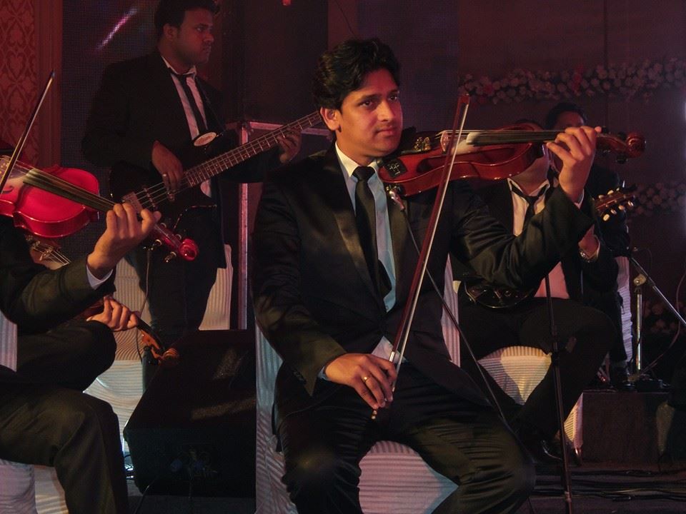 male violin player belgaum